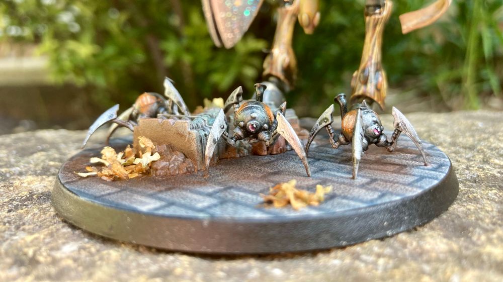 Close up of little spider dudes on base.