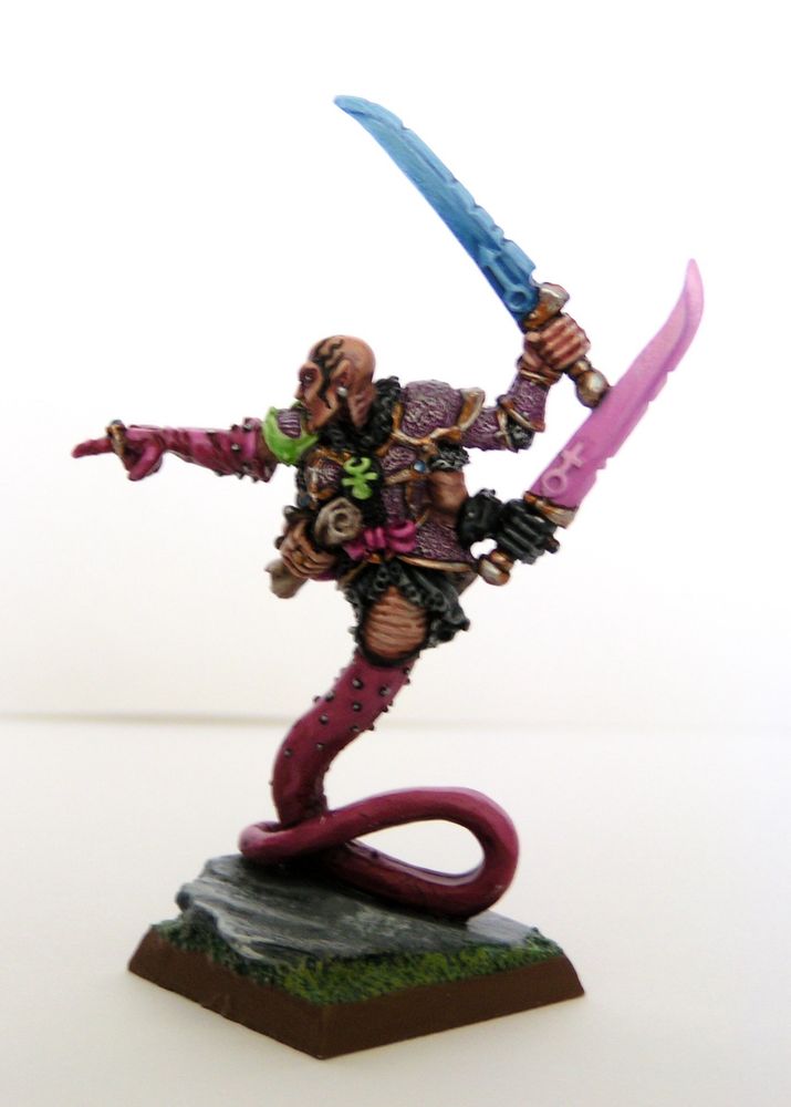 A champion of Slaanesh with extra arms and a snake tail.