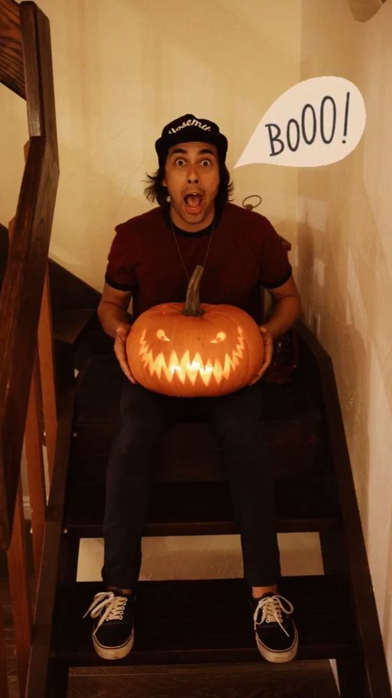 Vic being goofy with a pumpkin