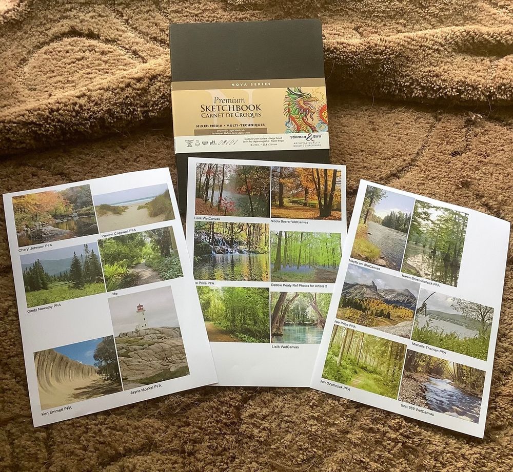 A Stillman and Birn sketchbook with three pages of coloured landscape photos printed out.
