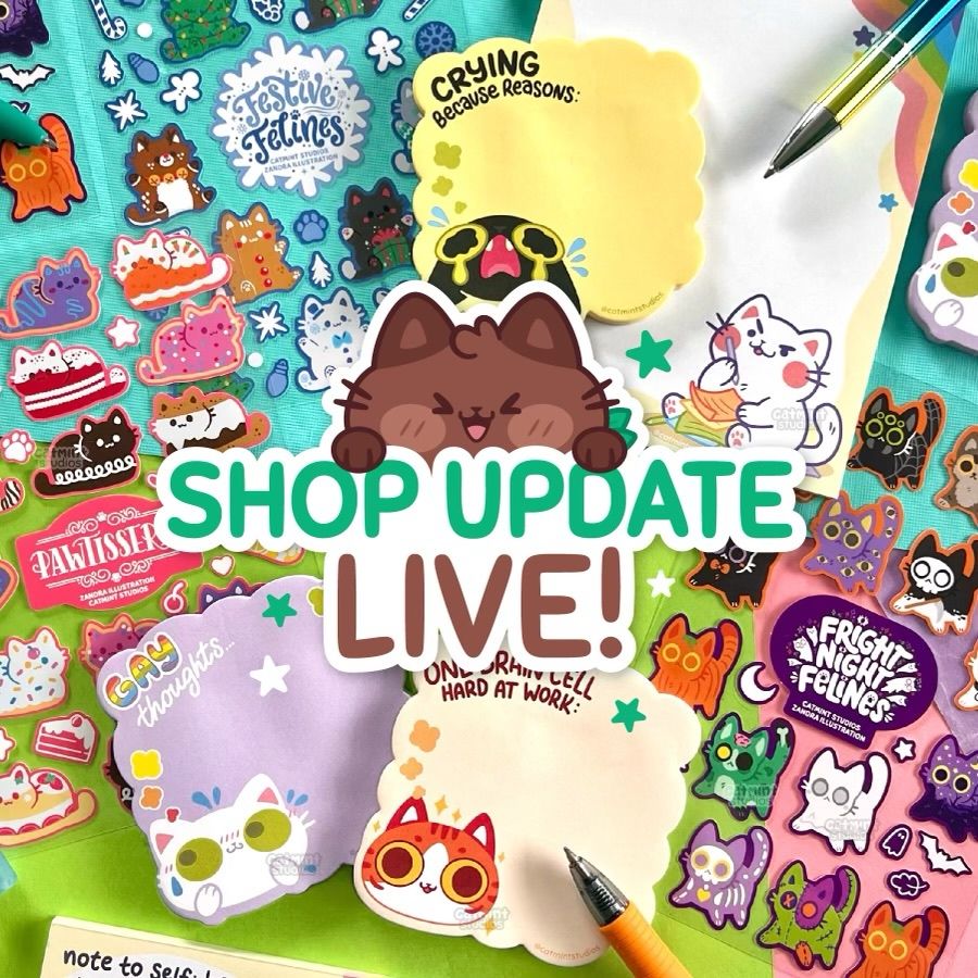 A shop update image for Catmint Studios. The text in the middle reads “shop update LIVE” and features our brown cat mascot Chip. Around the text are assorted new Catmint Studios products including notepads, sticky notes, and sticker sheets. 