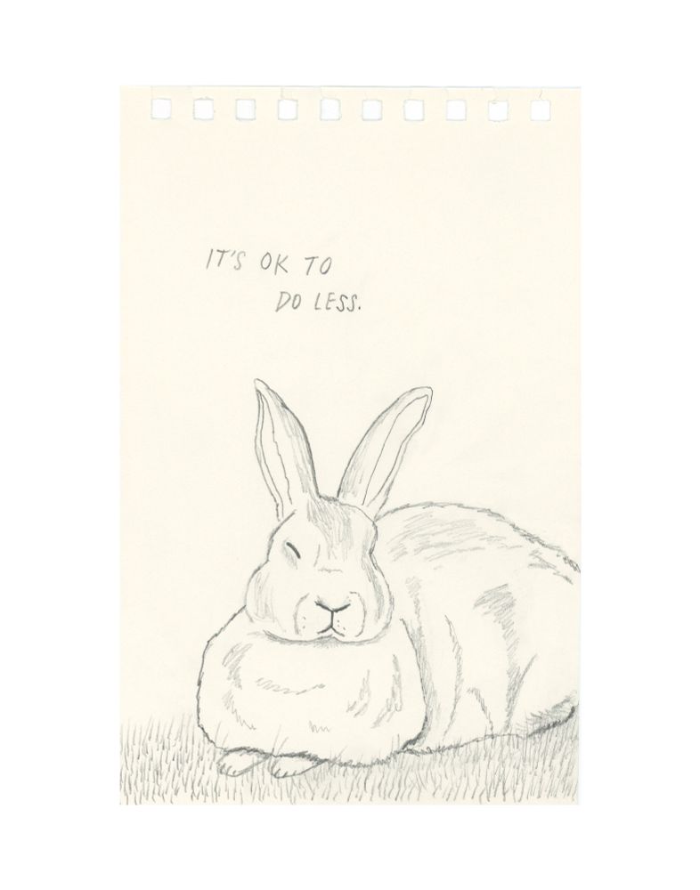 A pencil drawing of a rabbit sitting with their eyes closed, words above them read “it’s ok to do less”