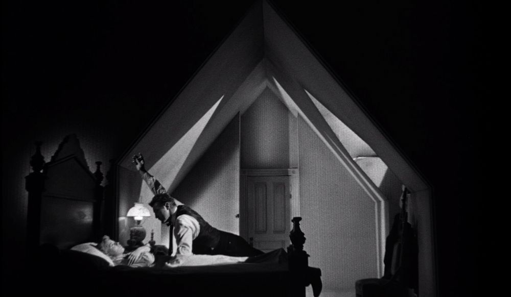 scene from night of the hunter in the bedroom. the light from the slanted window is bouncing off the walls in a very interesting manner 