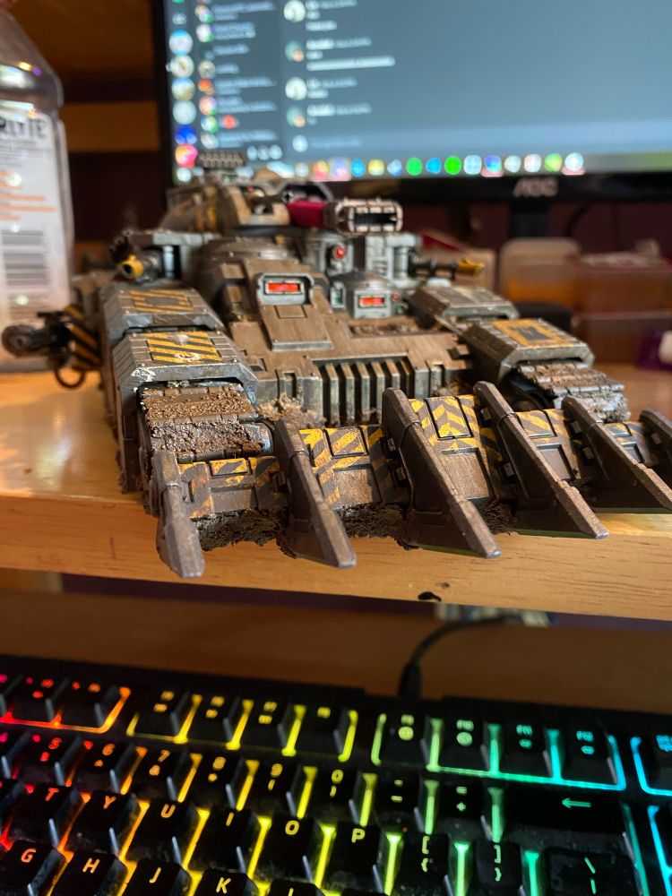An iron warriors kratos tank seen from the front