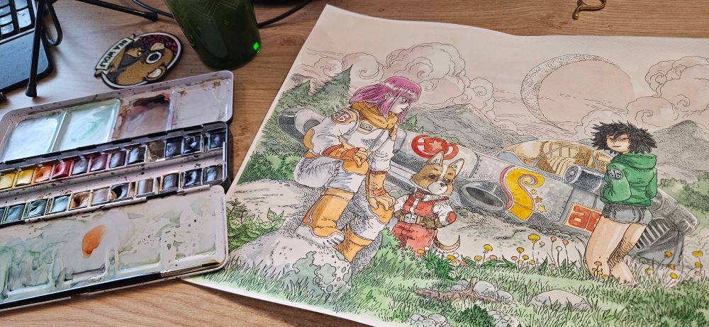 Une aquarelle représentant les personnages de Bolchoi Arena (deux jeunes femmes et un corgi humanoïde) devant un vaisseau spatial posé dans une prairie.
La boîte d'aquarelle est posée à côté du dessin.