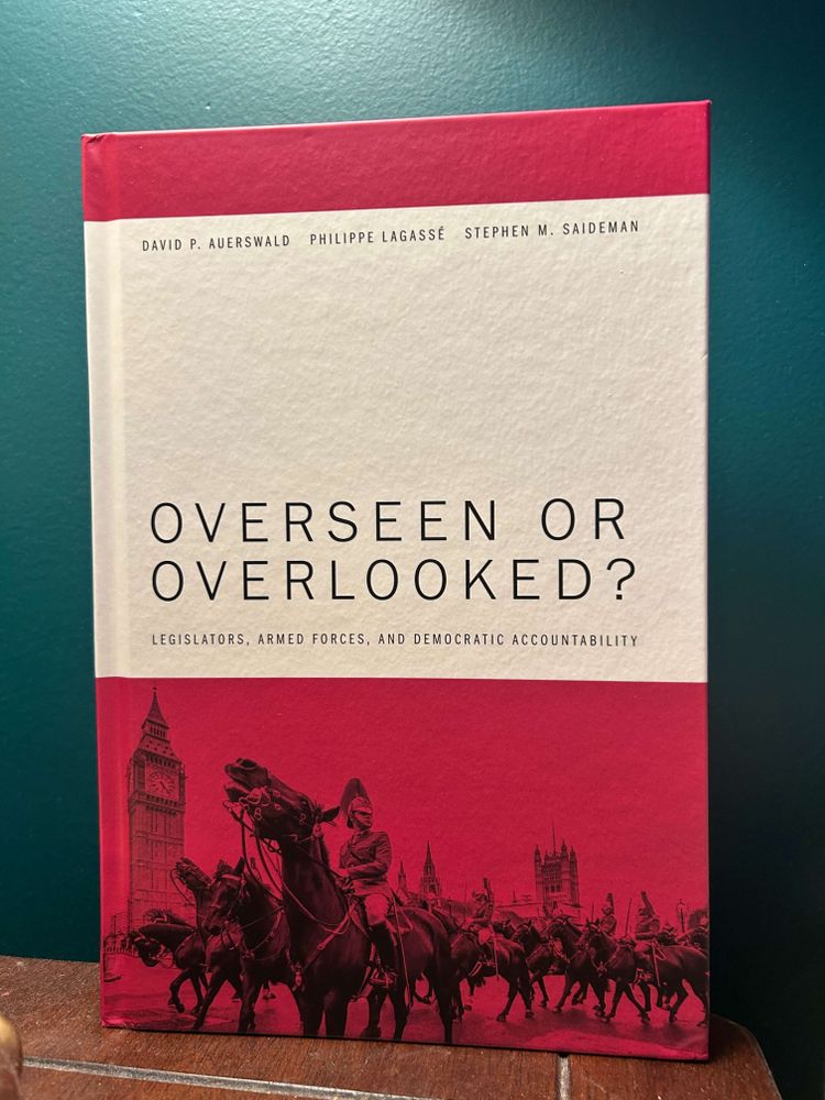 Actual photo of the first copy of the new Dave/Phil/Steve book on legislative oversight over the armed forces: "Overseen or Overlooked?  Legislators, Armed Forces, and Democratic Accountability."