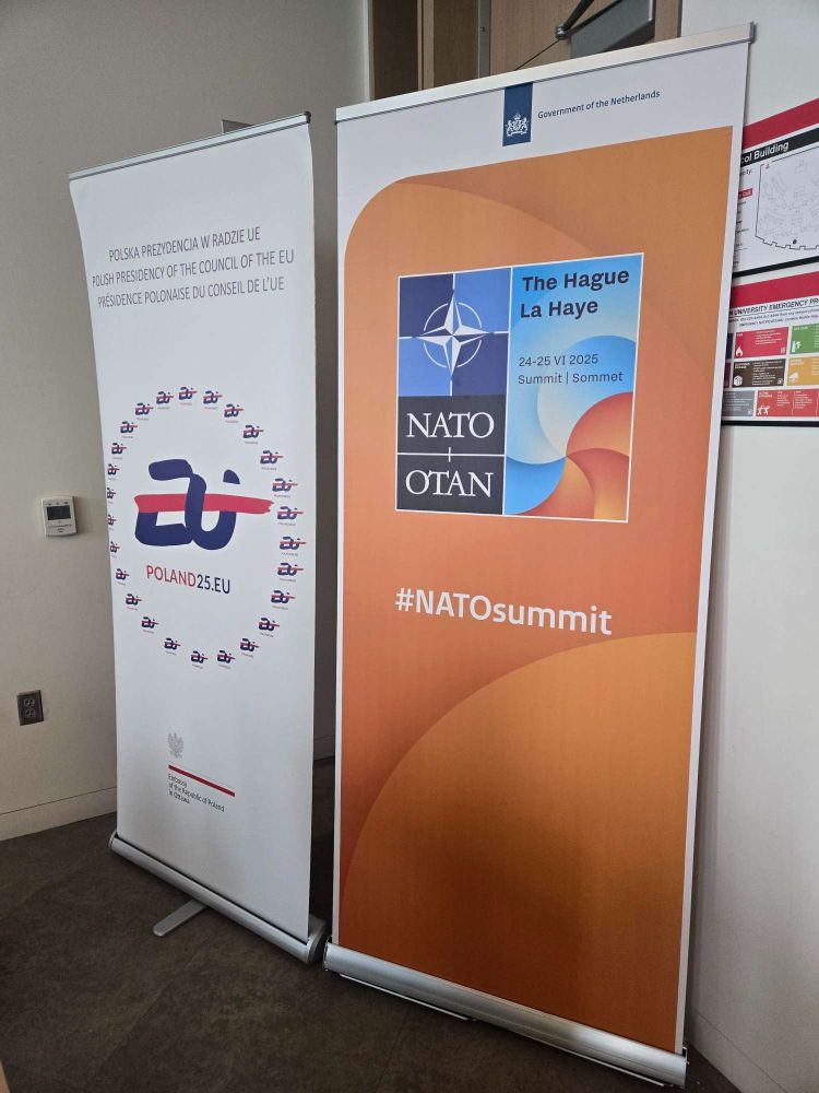 banners for the event at Carleton on the NATO summit including the Dutch embassy's official one (lots of orange)