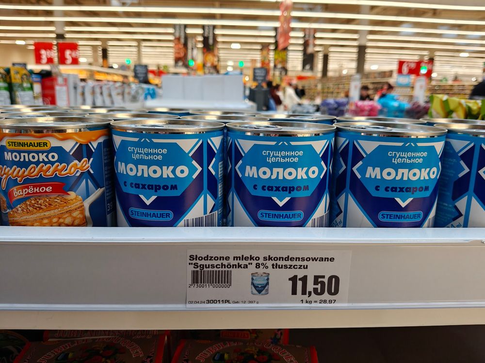Soviet era styled food product (condensed milk) with label in russian, sold in Polish Auchan.