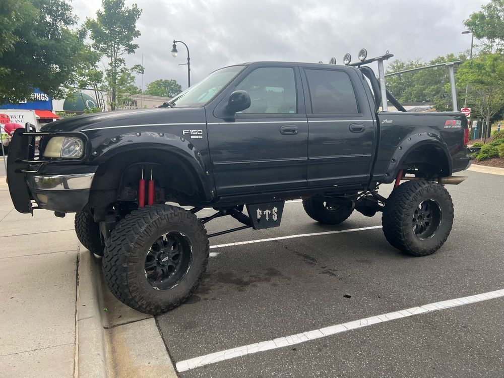 Jacked up wannabe monster truck of an F150