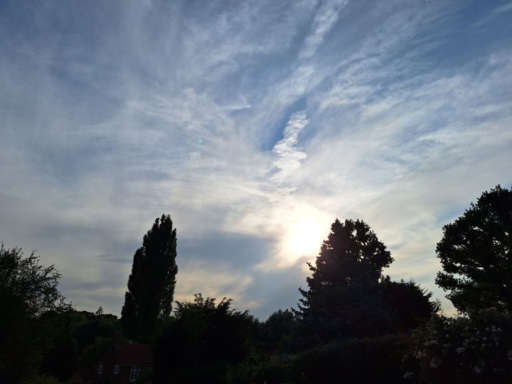 Partly blue skies, but lots of ice crystals forming on the near horizon