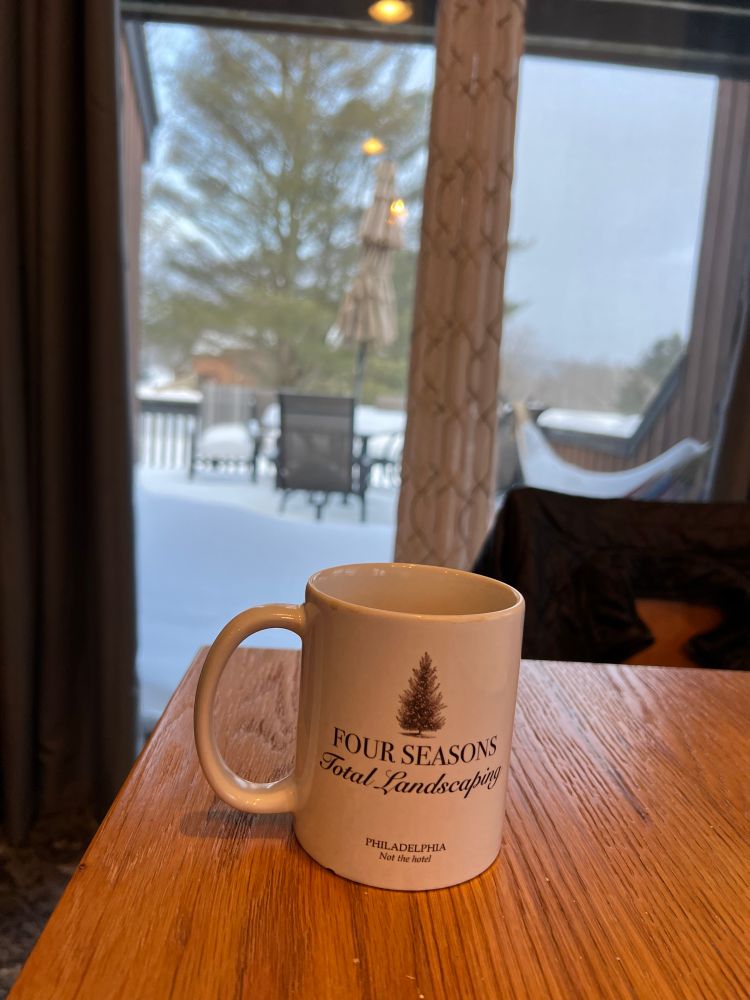 Four Seasons Total Landscaping coffee mug 