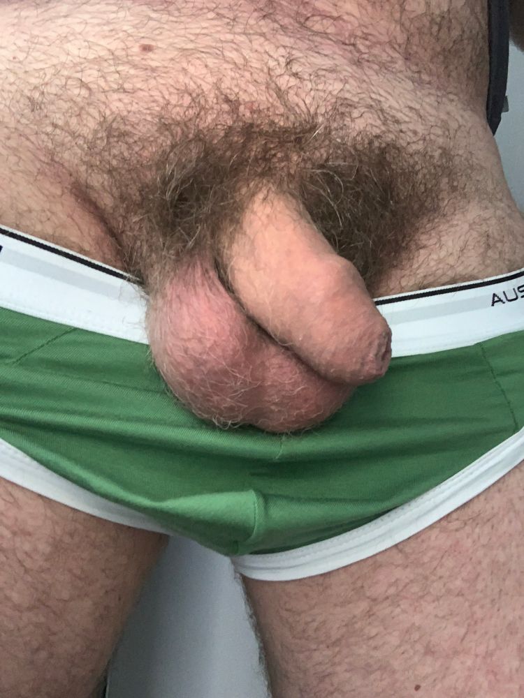 Pic of my soft penis and balls hanging over a pair of green briefs 