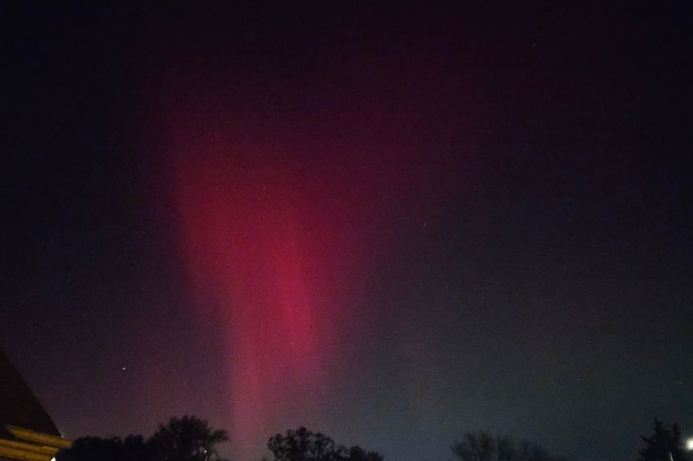 Northern Lights with a red hue in Rock Island (Photo by Ryan Jaster)