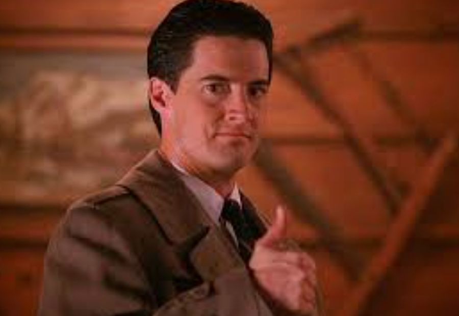 a blurry artifact-ed screen shot of a thumbs up from Agent Cooper in Twin Peaks, an image that has come to mean a great deal to many of us