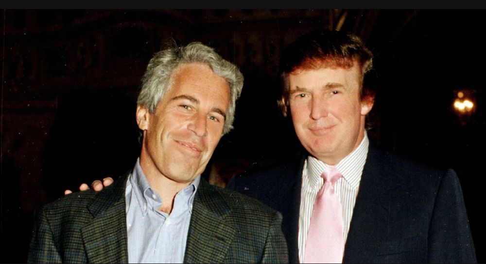 Trump and Epstein all buddy buddy. Trump's hand is on Epstein's shoulder. They're smiling together.