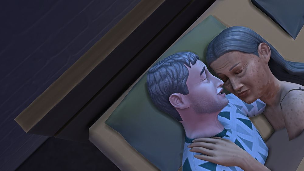 An elder male sim cuddling in bed asleep with his elder sim wife