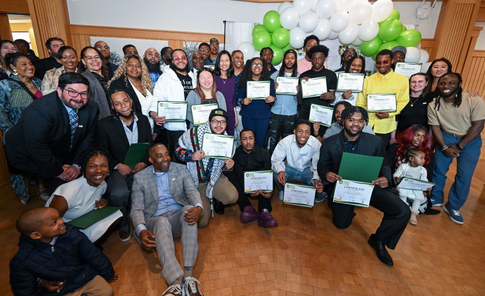 Photo of the 23 participants who completed the 4th PowerCorp Graduation with staff, event attendees, and Mayor Wu.
