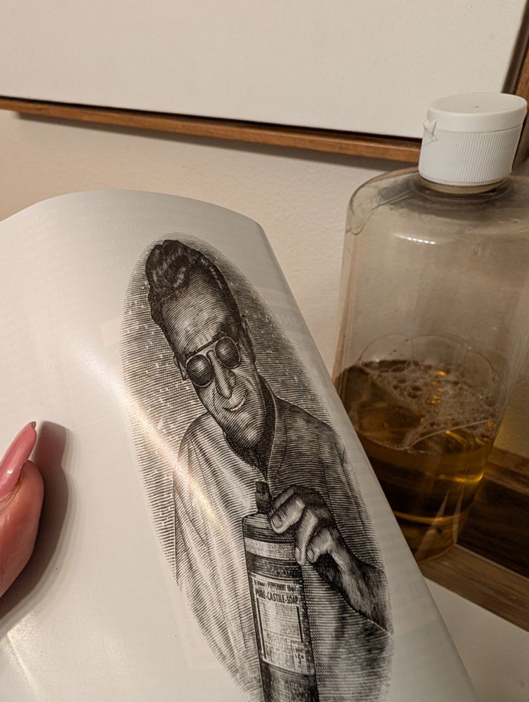 Inside of Dr. Bronner's Peppermint Soap label with his image