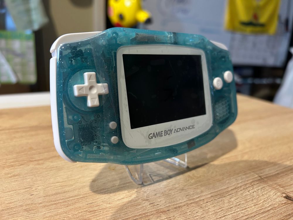 Glittery blue gameboy advance with all white buttons and faceplates
