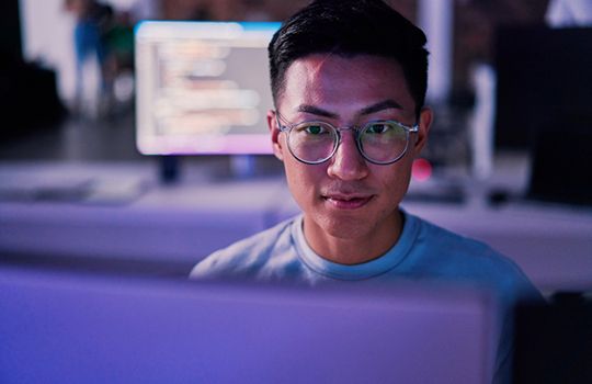 A researcher looking at data