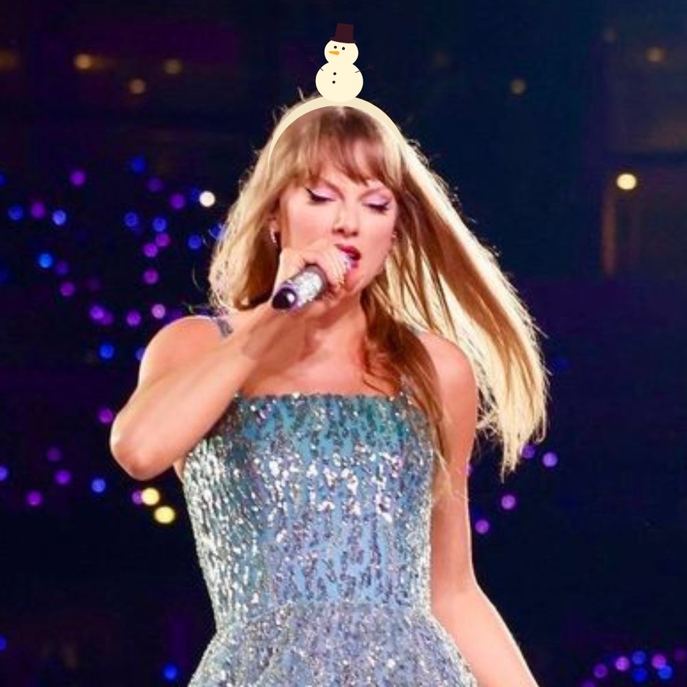 taylor swift eras tour elsa dress with snowman headband up close