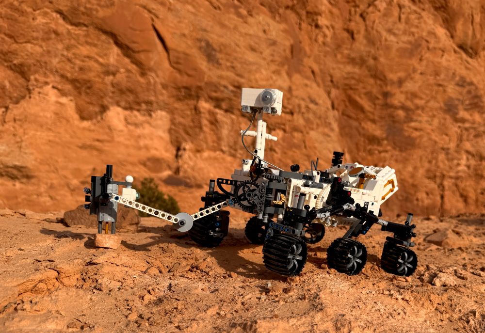 A Lego model of the Perseverance Mars rover photographed in the Mars-like deserts of Utah near Moab.