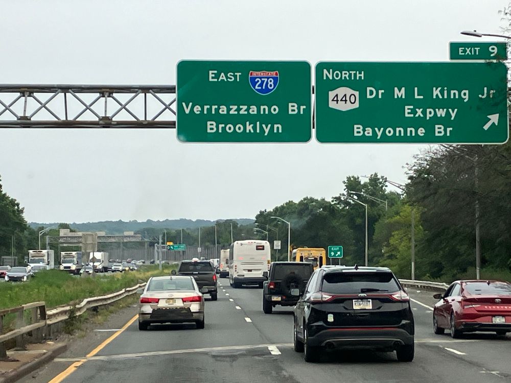 Road signage along Interstate 278 indicating the Verrazzano-Narrows Bridge from Staten Island into Brooklyn, NYC