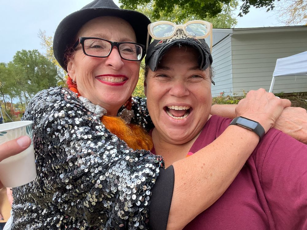 A photo of Dina and a supporter at the Eastmorland Fall Fest in Ontario Park.