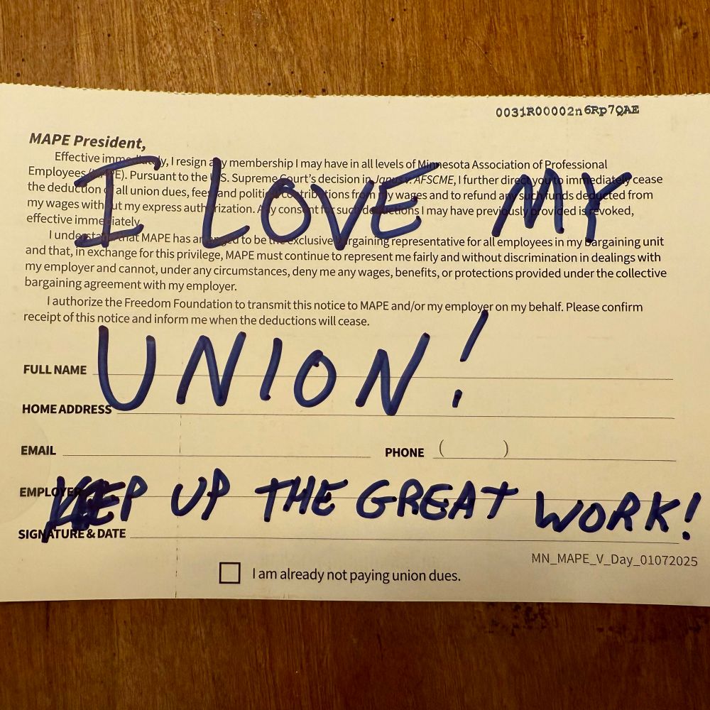 Deceptive mailer return card with “I love my Union, Keep up the great work” written across it with a sharpie marker. 