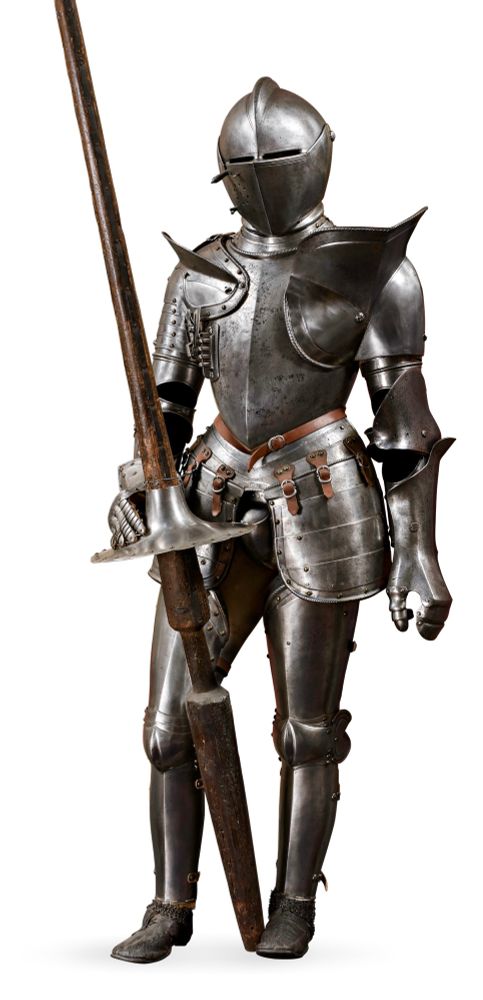 Full suit of metal armor plate. Includes pole for jousting. Suit is arranged to appear to be standing, pole leaning on one foot and held upright by another hand