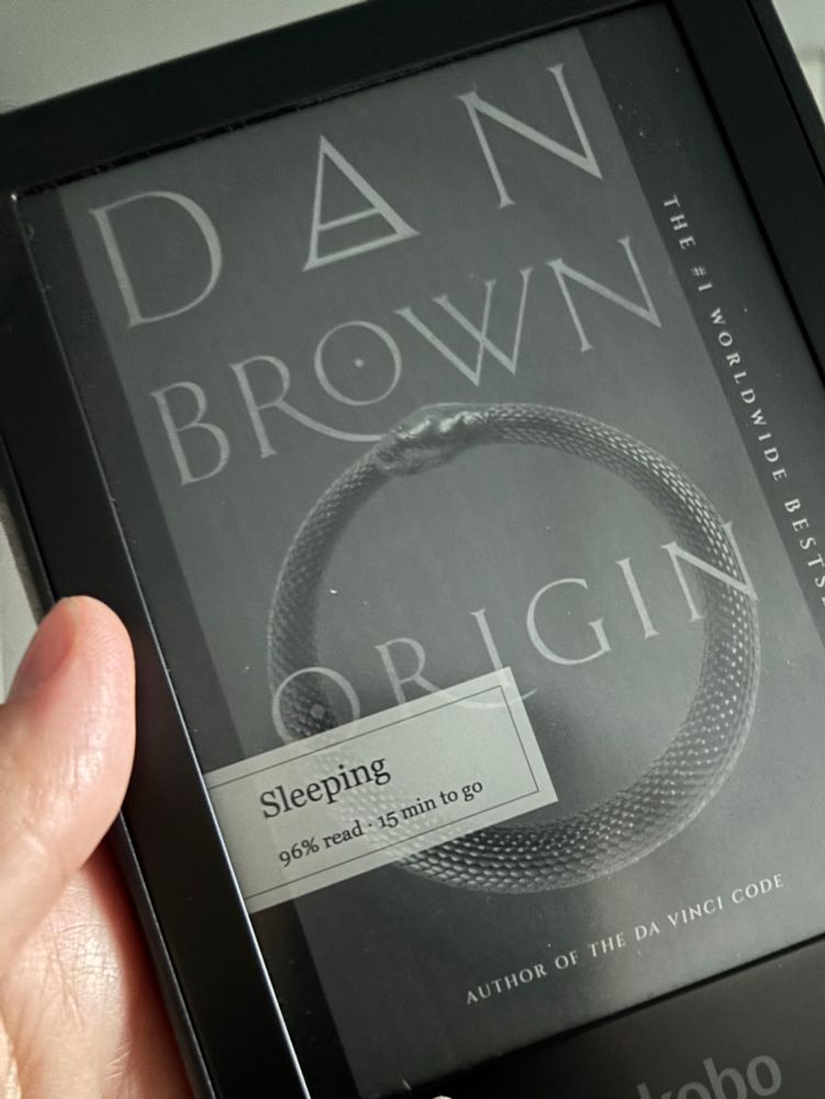 The cover of ORIGIN shows a symbol of a snake eating its own tail.