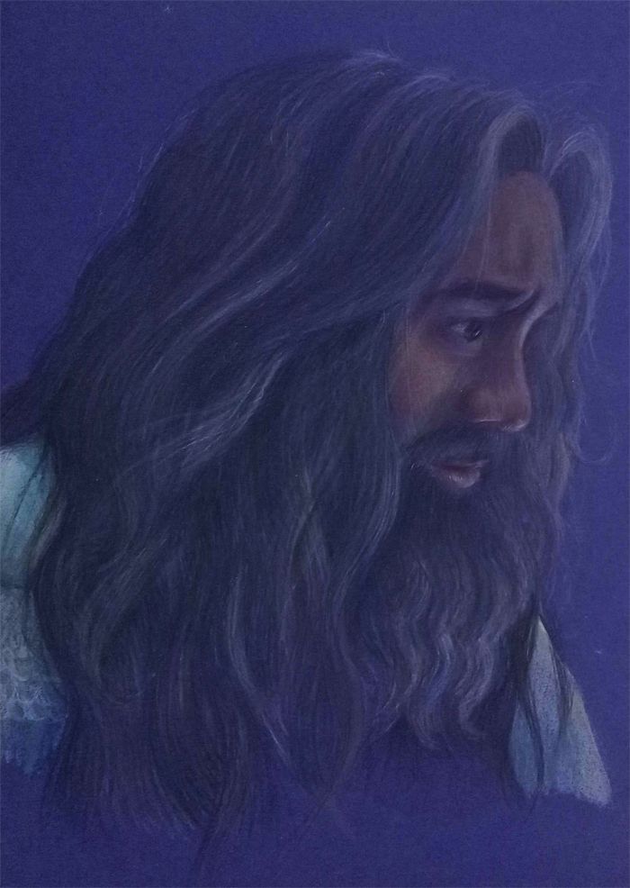 A coloured pencil drawing of Ed Teach in profile with soft light reflected on his face and hair