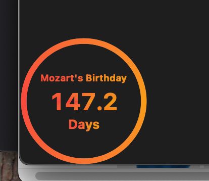 screenshot of countdown timer to Mozart's Birthday (Jan 27th). Color scheme was default (orangy-red and yellow) I swear