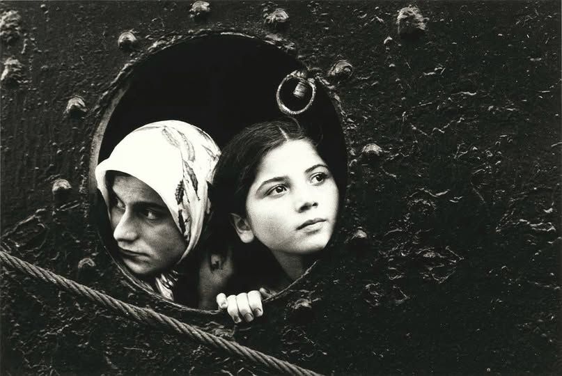 Mary Ellen Mark
American, 1940–2015
Immigrants in ship porthole, 1977
Istanbul, Turkey