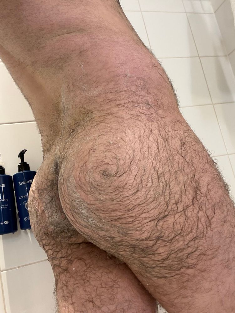 Wet Gary butt, slightly soapy with the hair swirling to the centre. Or if you just follow part of it to the crack. 