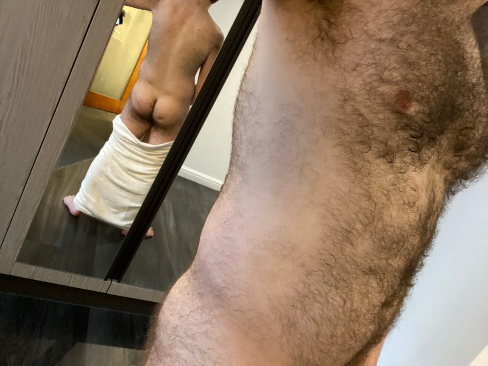Mirror shot in towel, with towel down showing butt. 