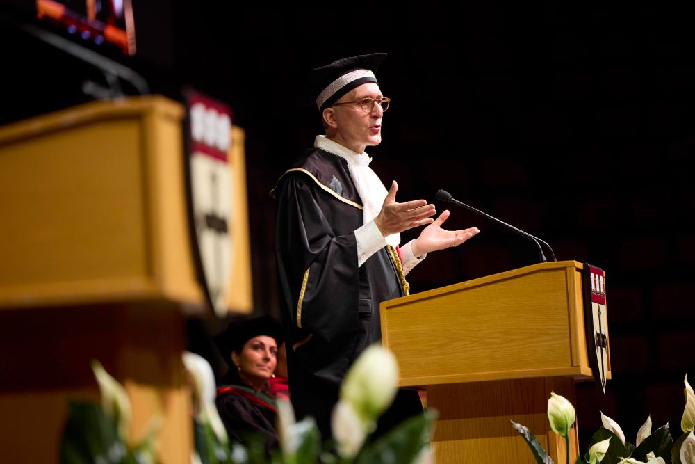 Dean Andrea Baccarelli addresses the Harvard Chan School of Public Health Class of 2025 during the Convocation ceremony.