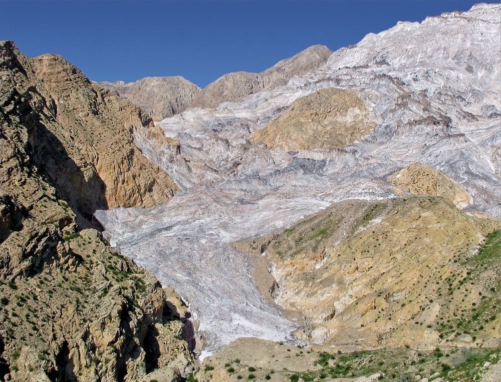 Salt glacier flowing down a valley in the Zagros mountains, Iran.