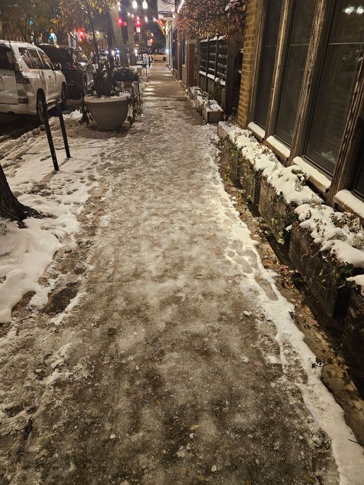 Snow and ice covered sidewalk