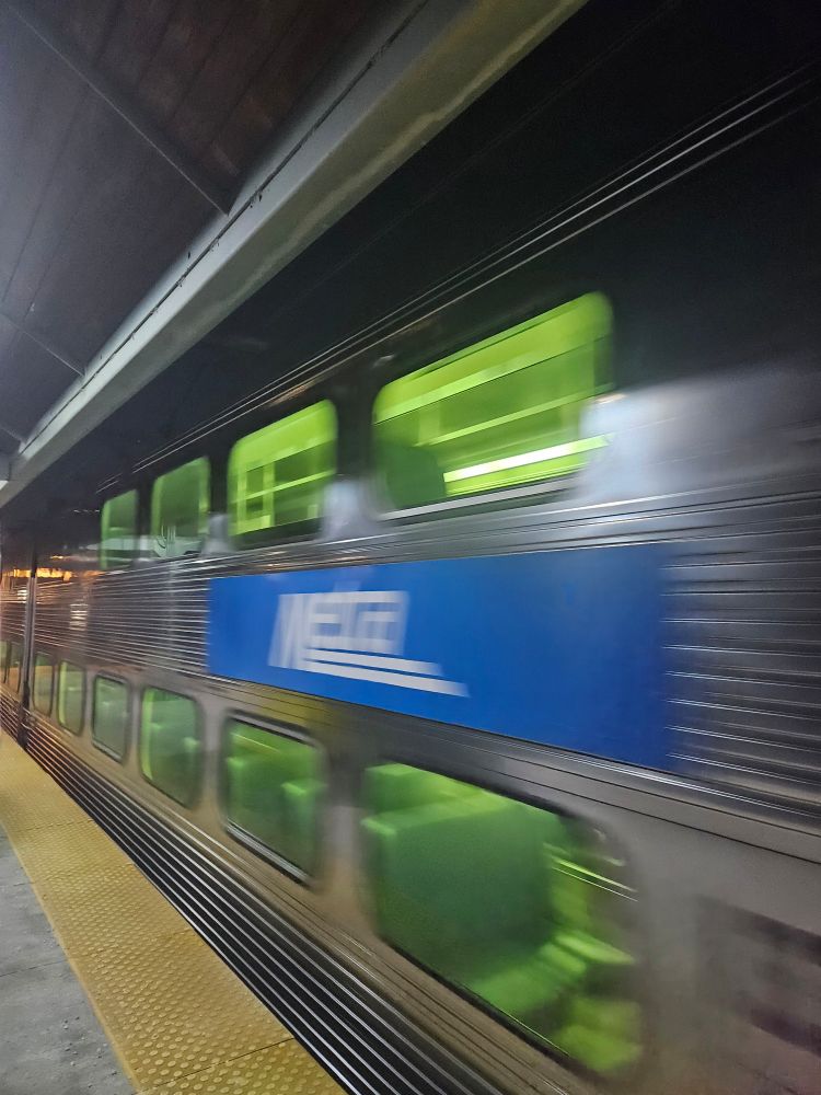 Metra zooming by