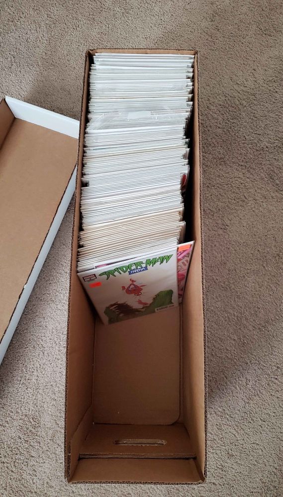 Long box of comic books