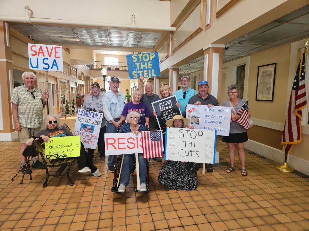 Outside Rep. Steil's Janesville office - dark and locked during posted business hours.