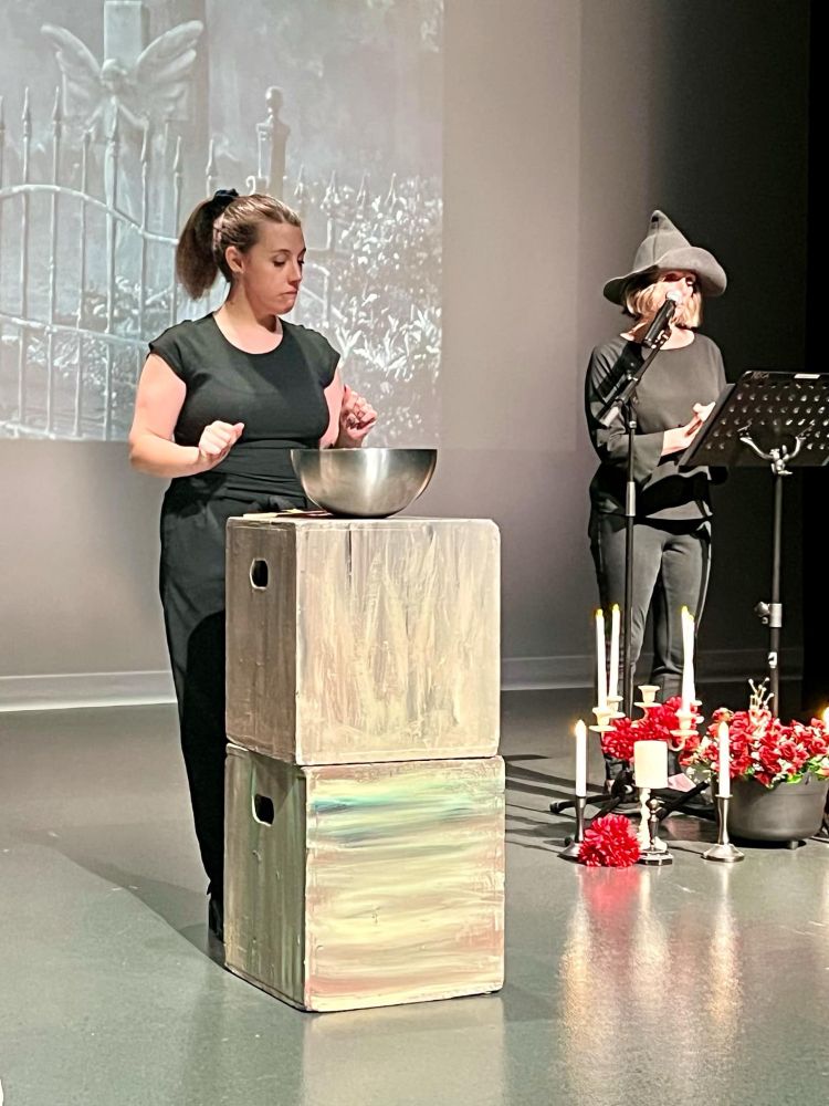 Actor staring at a bowl in hesitant acceptance