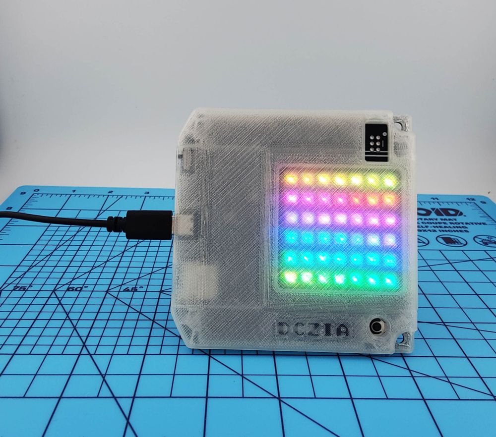 DCZia Defcon 33 badge preview 
Blinking lights in a zipdisk package