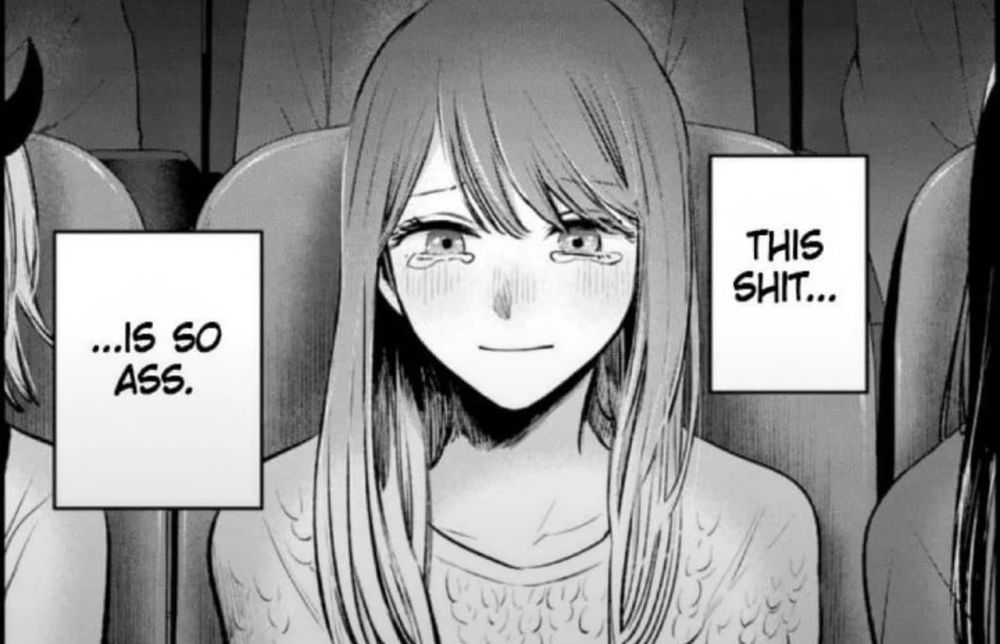 A anime woman in a theatre saying"this shit... is so ass"