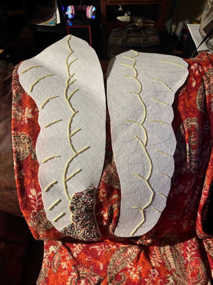 Two wings in progress, going to be covered in bead soup