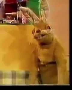 Hartley Hare forced to march in front of the camera like a deposed dictator