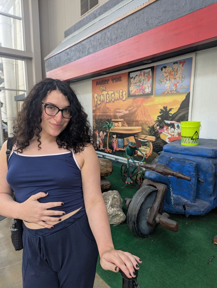 Me in front of the Flintstones Display