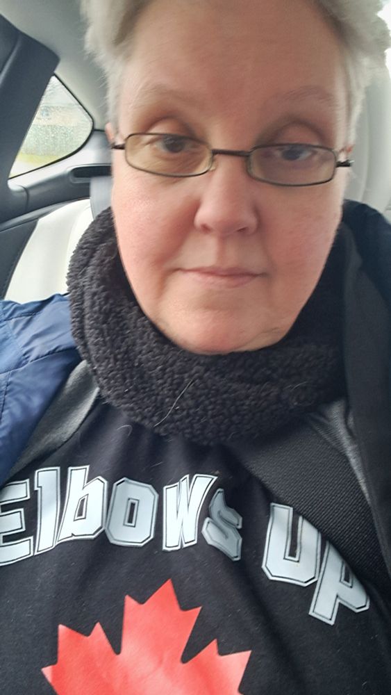 Thea wearing her Elbows Up tshirt with a red maple leaf