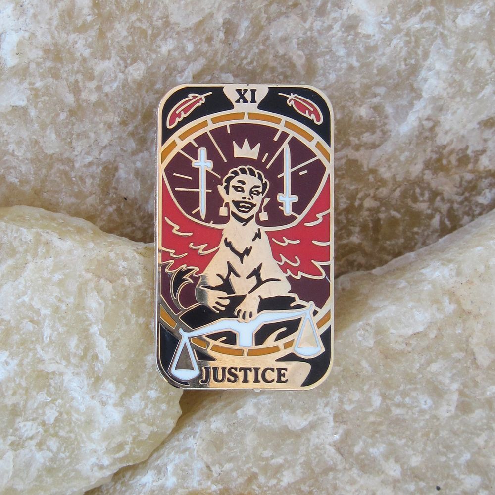 photo of enamel pin version of sphinx design 